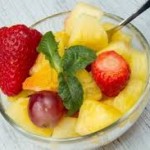 9228826-a-fresh-fruit-salad-with-pineapple-orange-grape-and-strawberries